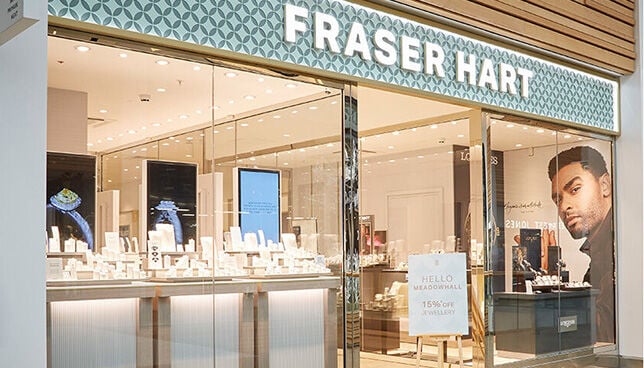Fraser Hart jewellery store exterior at Meadowhall shopping centre, featuring illuminated branding and modern window displays.